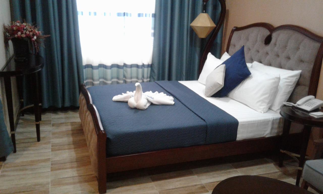 Отель Charos Dormitel Dumaguete City Экстерьер фото